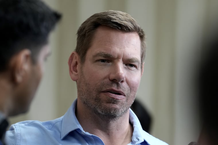 Rep. Eric Swalwell (D., Calif.) talks with reporters after holding a town hall meeting on April 7 in Sacramento.