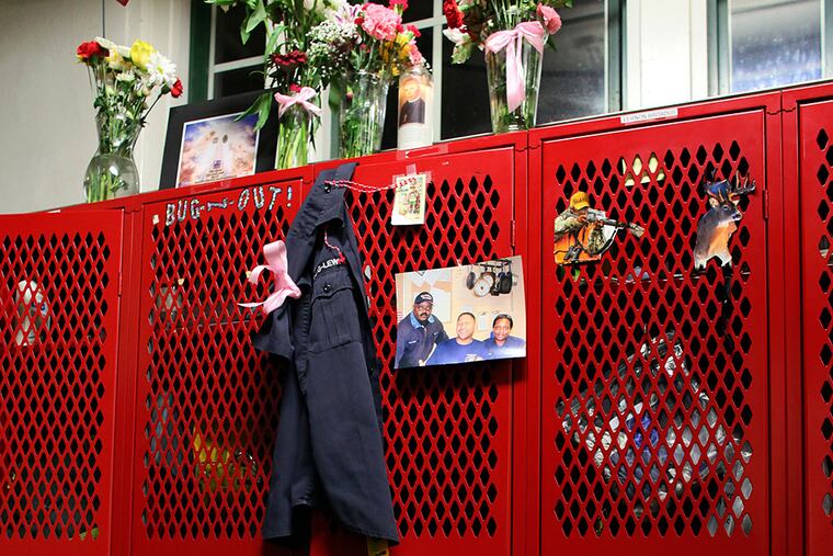 Memorials adorn the locker of fallen firefighter Joyce Craig at Engine Company 64.