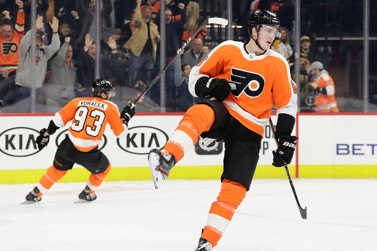 Defenseman Travis Sanheim and forward Jake Voracek celebrate Sanheim's third-period goal against the Bruins in January. Sanheim, 23, has eight goals this season, one shy of the career high he set last season.