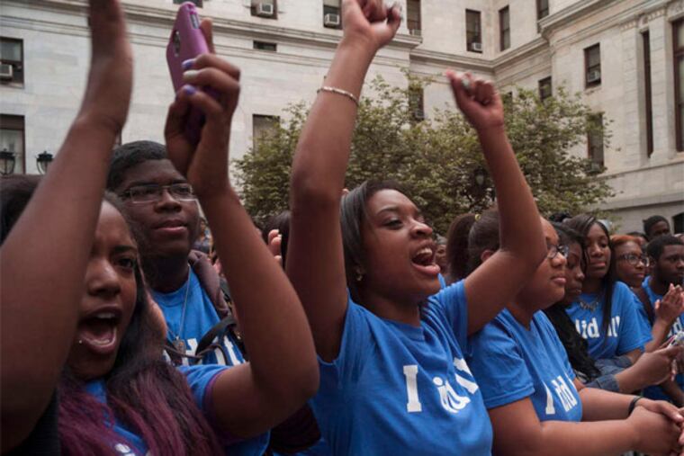 City students cheered the mayor as he discussed school funding last month.