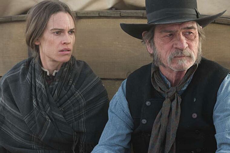 Hilary Swank and Tommy Lee Jones star in "The Homesman." (Roadside Attractions)