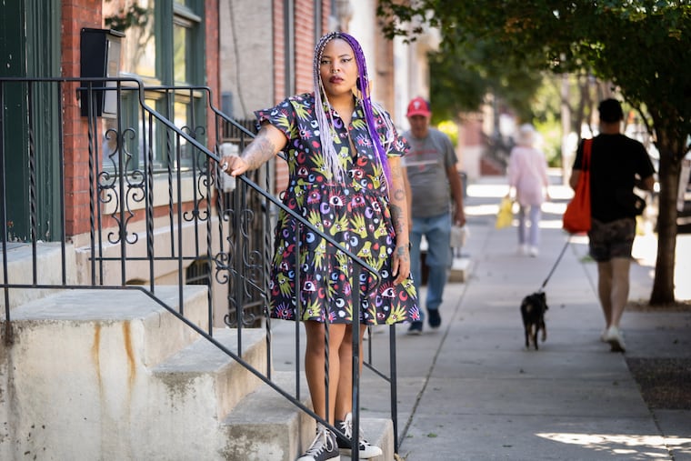 Adesola Ogunleye-Sowemimo stands on her stoop in Fishtown on Friday. She'll be launching a pop-up series on Sept. 27 highlighting Nigerian cuisine.