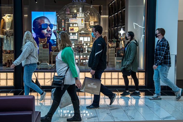 Customers shop on Black Friday at the King of Prussia Mall.