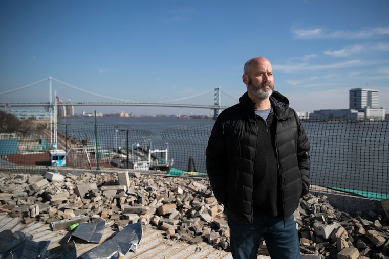 Developer Avram Hornik poses for a portrait at the construction site of the indoor and outdoor restaurant, Liberty Point, on the site of the Independence Seaport Museum on Penn’s Landing in Philadelphia on Tuesday, Feb. 8, 2022.