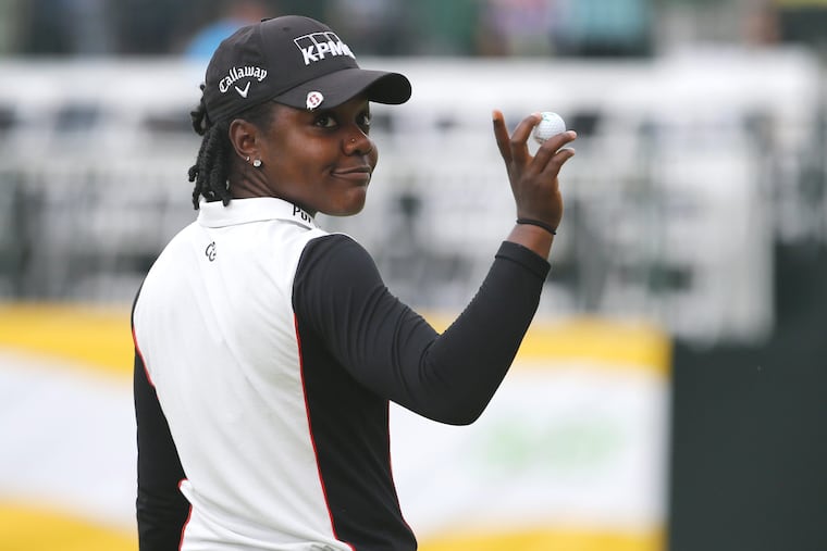 Mariah Steakhouse waves to fans after finishing the second round of the ShopRite LPGA Classic golf tournament on Saturday.