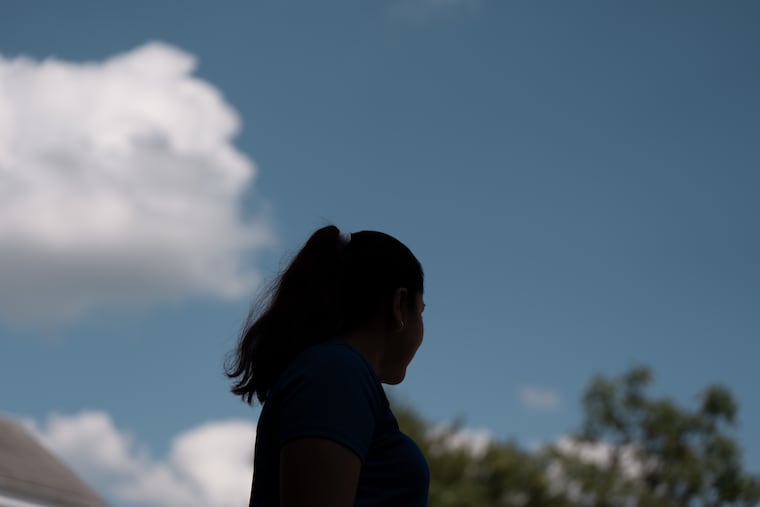 Erika Moreno, shown here in Norristown, on July 21, 2025, not long after her partner was arrested by ICE. He called from the roof of the Super Gigante market, saying agents were in the building and people were trying to hide.
