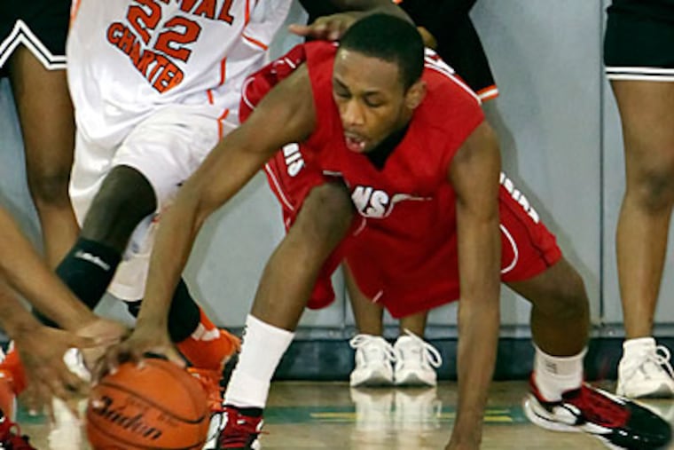 Karon Keene scored eight of his 17 points for Mansion in the fourth quarter. (Steven M. Falk/Staff Photographer)