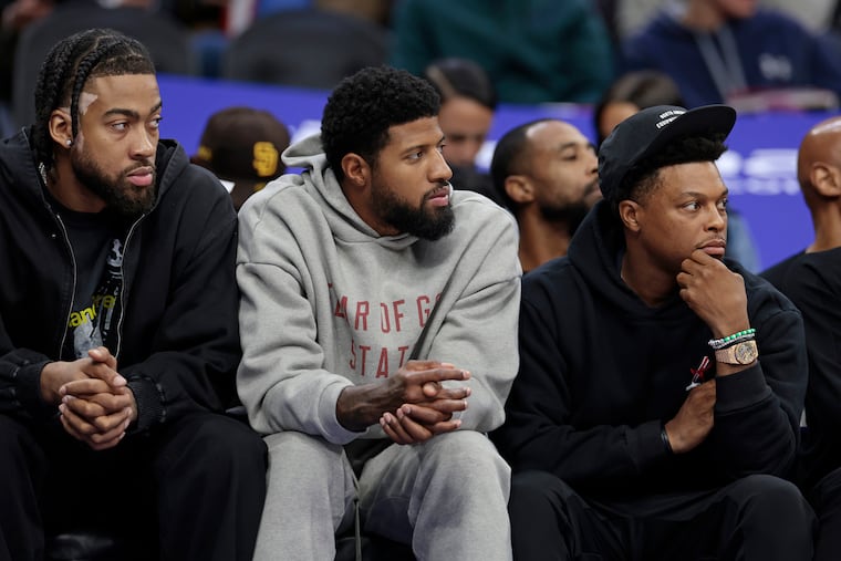 Paul George (center) could be close to making his season debut with the Sixers.