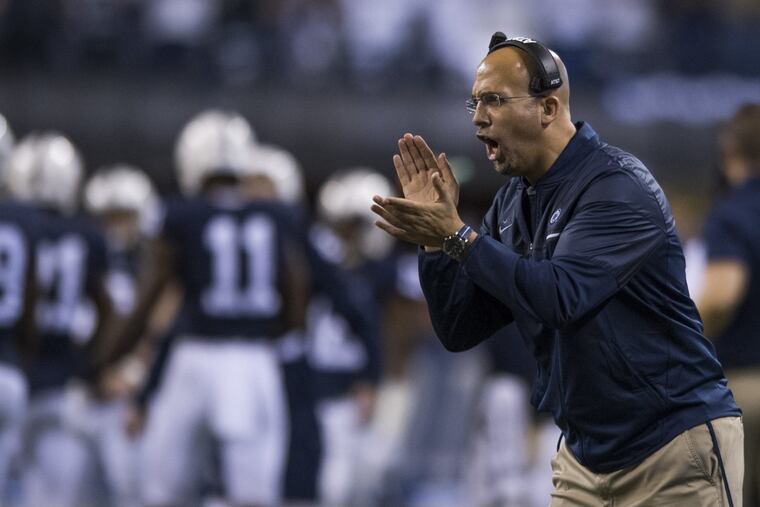 Penn State football coach James Franklin exhorts his team during the Big Ten Championship Game in Indianapolis December 5, 2016. The Nittany Lions won the championship, beating Wisconsin.