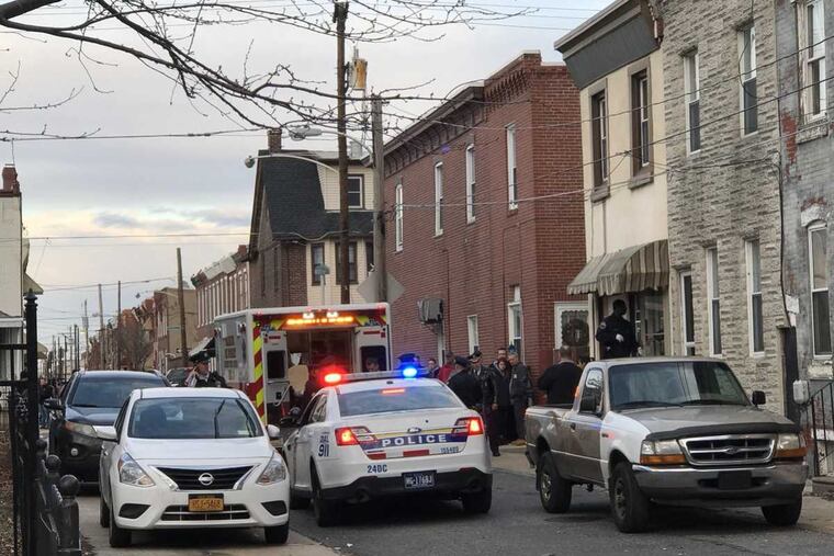 The scene in the 2900 block of Mercer Street in Port Richmond, where a veteran Philadelphia police officer and her boyfriend were found dead in her home Monday, Feb. 26, 2018.