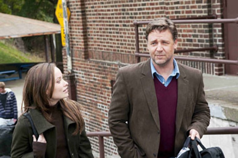 Russell Crowe is the husband intent on liberating his imprisoned wife. Olivia Wilde plays a friend in "The Next Three Days."