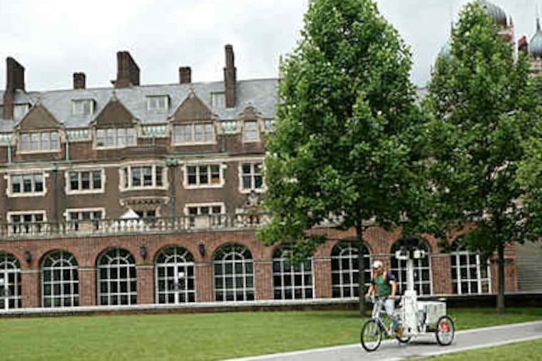 The Penn campus with a Google camera unit passing through in June. The school "made a decision ... to make a difference in West Philadelphia," said Evan S. Dobelle, survey author. (MARK STEHLE / Associated Press)