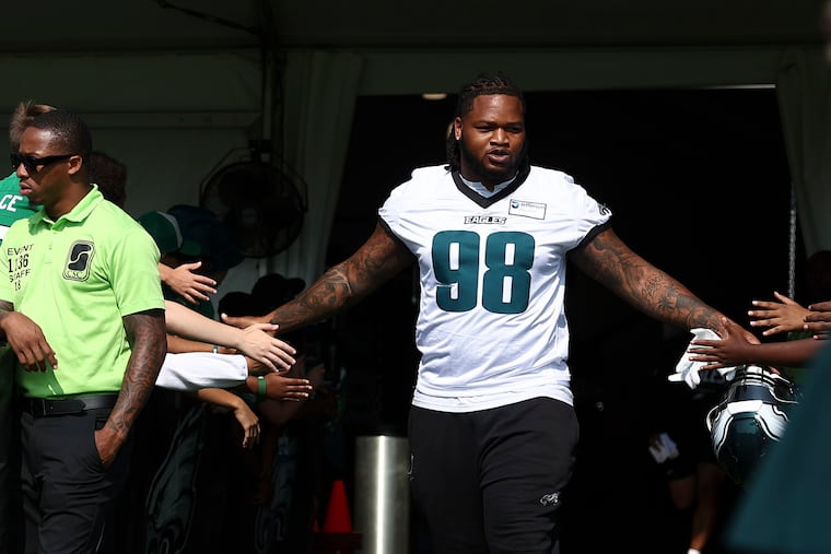 Jalen Carter takes the field during the first day of training camp on Wednesday.