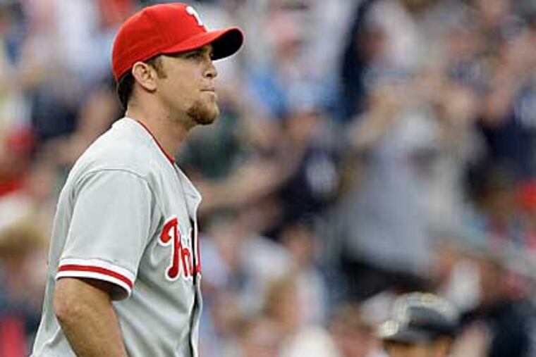 Brad Lidge reacts after surrendering a game-tying home run to Alex Rodriguez during the ninth inning in New York. The Phillies lost the game 5-4. (AP Photo/Frank Franklin II)
