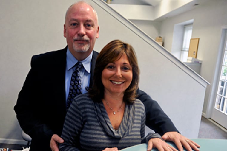 Gene and Michele Rice with the People magazine article about their Plant a Seed Inspire a Dream Foundation. (Ron Tarver /Staff Photographer)