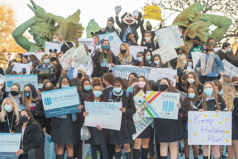 In the fountain at Logan Square, students from John W. Hallahan Catholic Girls High School protest the closing of their school by the Archdiocese of Philadelphia on November 20, 2020.