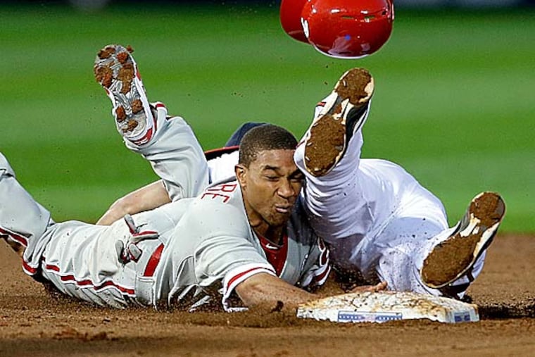 Batting Ben Revere first allowed Charlie Manuel to keep his two speed players at the top of the order. (David Goldman/AP)