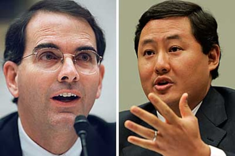 Former Justice Department officials Jay Bybee (left) and John Yoo are accused of authorizing torture. (AP Photos)