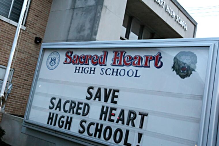 When the proposed closing of Sacred Heart was announced, alumni, parents, and students formed committees to see what they could do to keep their school open. Their efforts paid off Friday. (Steven M. Falk / Staff Photographer)