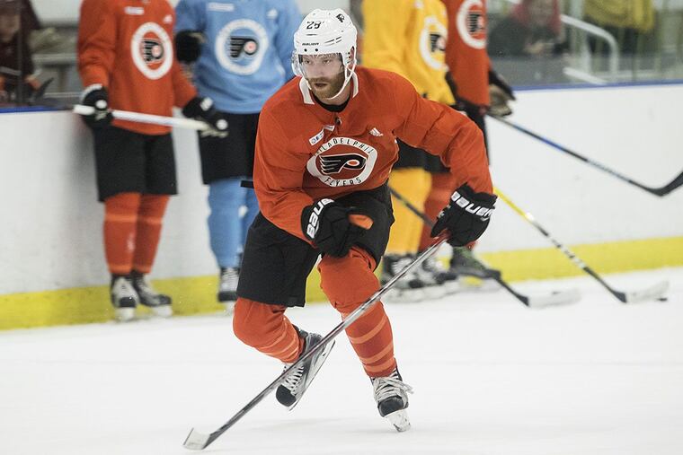 Flyers captain Claude Giroux practices during training camp in Voorhees.