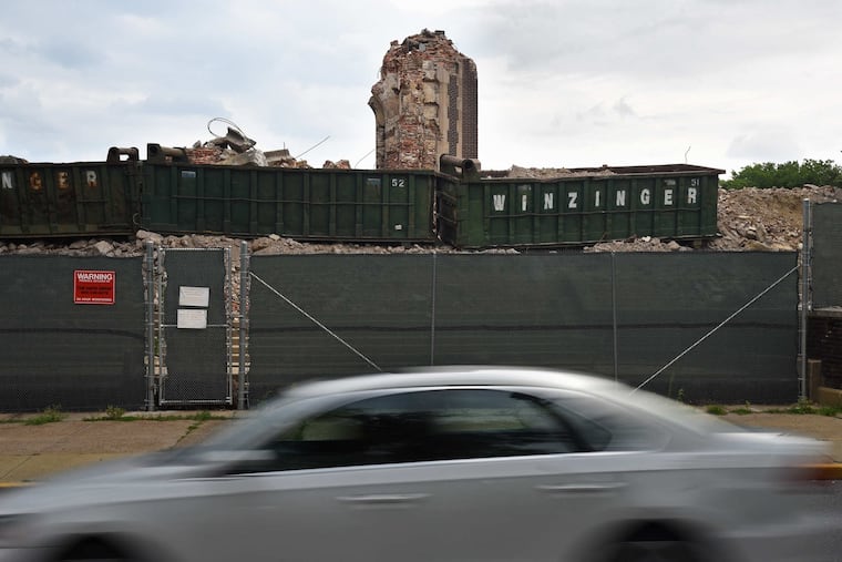 There is not much left of Camden High School Tuesday, July 17, 2018 as demolition continues.