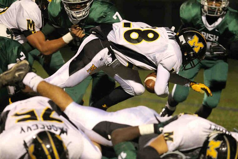 Moorestown's Sidney Ruffin scores the Quakers' first touchdown in the first quarter. Moorestown is 6-2 and should be a factor in the South Jersey Group 3 playoffs.