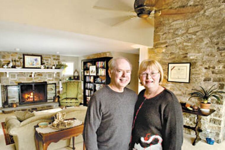 Charles and Barbara Brynan in the living room/library of their house in Perkiomenville, PA. ( Clem Murray / Staff Photographer)