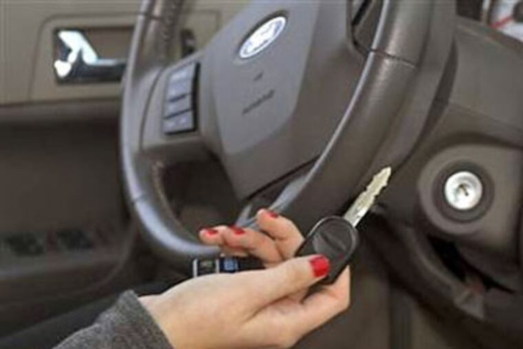 Ford Motor Co. has rolled out a new computerized car key feature, called MyKey, that lets parents limit the car's speed to 80 mph and set a maximum volume for the audio system on some 2010 models. (Ford Motor Co. / AP)