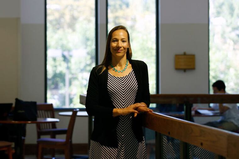 Meghan Juday directs the Initiative for Family Business and Entrepreneurship at St. Joseph’s University. “There’s a lot of business help, but few resources for family businesses,” she says. (YONG KIM/Staff Photographer)