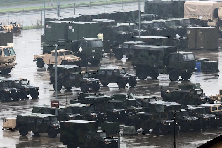U.S. military vehicles are parked at Camp Humphreys in Pyeongtaek, South Korea, Friday, Aug. 21, 2026.