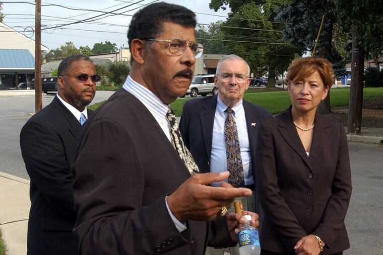 Mr. Porter, shown here as president of the East End Neighborhood Association, leads a tour in West Chester for local and state officials.