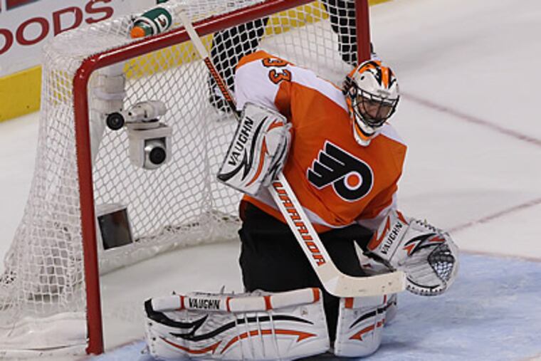 Flyers goaltender Brian Boucher lets in the game-winning goal in overtime. (Michael Bryan/Staff Photographer)