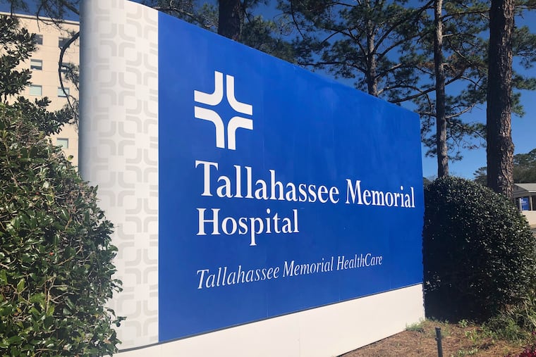 A sign is seen outside Tallahassee Memorial Hospital on Feb. 3, 2023, in Tallahassee, Fla. (AP Photo/Anthony Izaguirre, File)