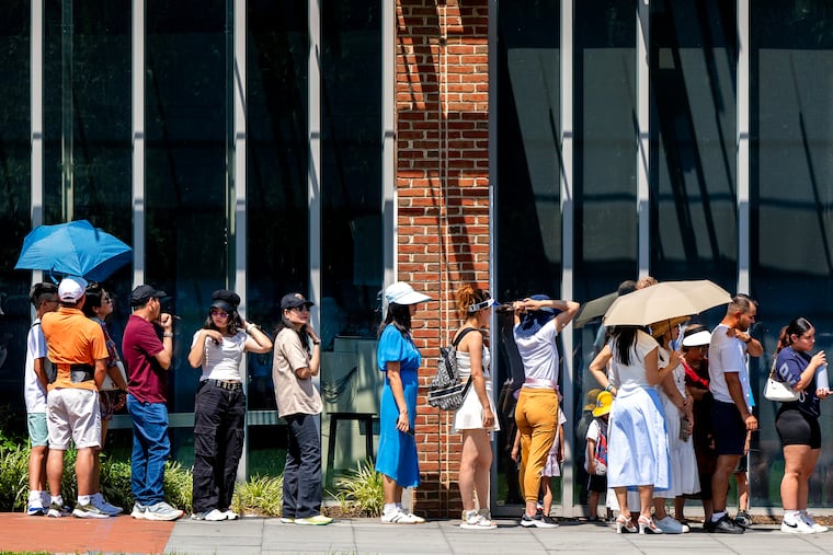 Visitors wait to see the Liberty Bell in Independence National Historical Park amid a heat advisory earlier this month.