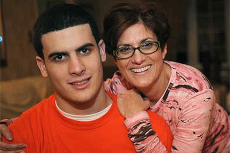 This year, it costs $75 for Stephen DeMaria to play football at Marple Newtown High School. His mother, Mariann, said that such fees plus the price of equipment could cost parents up to $900 a year. (Sharon Gekoski-Kimmel / Staff Photographer)