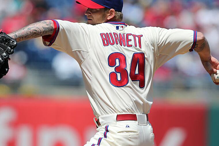 A.J. Burnett throwing against the Braves. (David Maialetti/Staff Photographer)