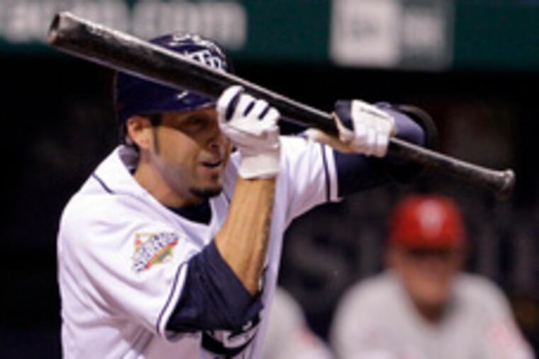 Rays' Jason Bartlett lays down bunt in fourth to score a run.