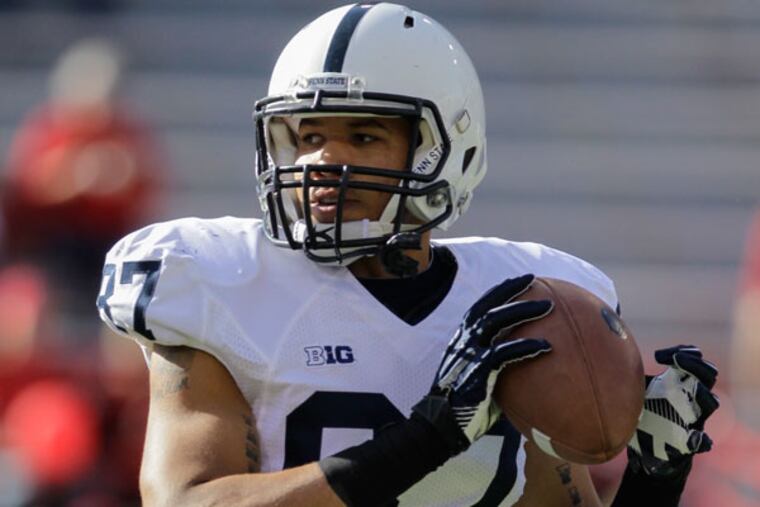 Penn State's Kyle Carter catches the ball in pre-game practice before playing Nebraska in an NCAA college football game in Lincoln, Neb., Saturday, Nov. 10, 2012. Nebraska won 32-23. (Nati Harnik/AP)