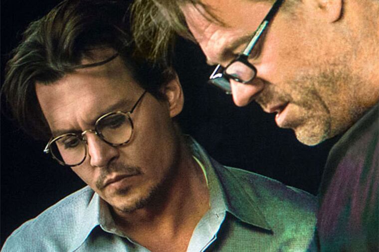 Wally Pfister (right) directs Johnny Depp in "Transcendence." (Peter Mountain)