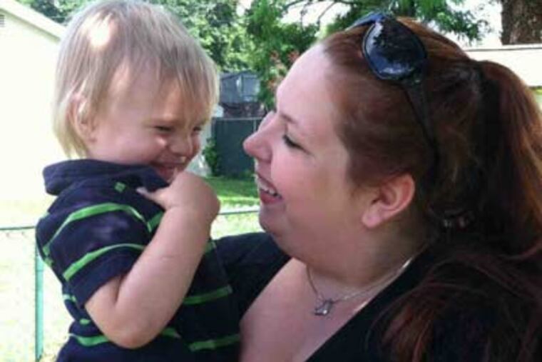 Lynn Heinsich of Croydon, with son Liam, was a target of Facebook's fight against offensive pictures.