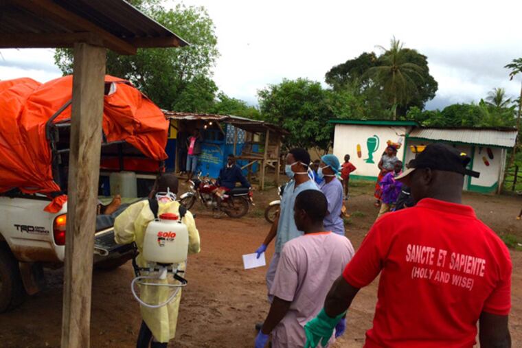 An ambulance waits outside an Ebola treatment center in Bong County.