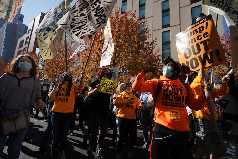 Demonstrators on Friday outside the Pennsylvania Convention Center in Philadelphia, where the city's votes are being tallied and where people have rallied in support of counting every vote.
