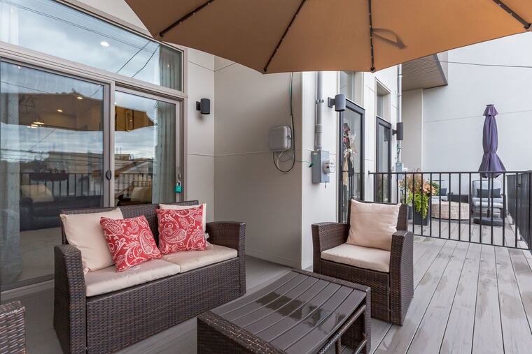 One of the owners likes how the indoor and outdoor spaces, such as the front porch, blend together.