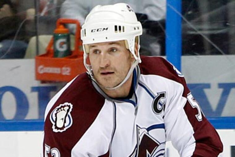 The Flyers may pursue a veteran defenseman, like Colorado's Adam Foote. (John Bazemore/AP Photo)