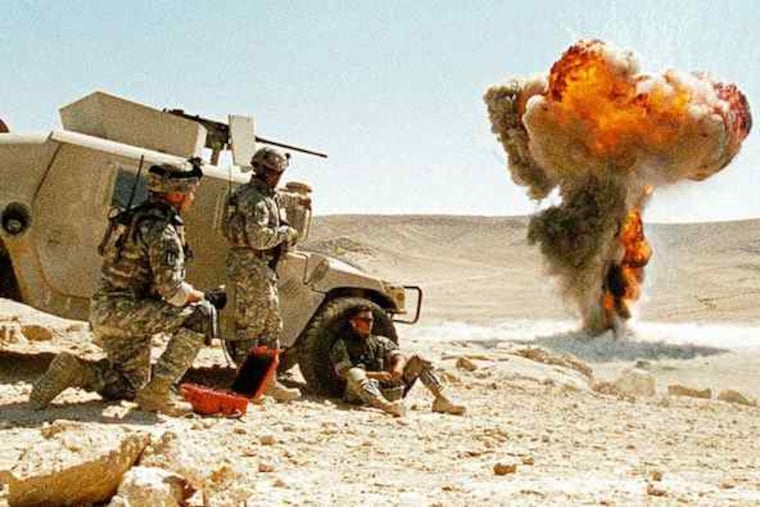 The EOD team detonates a bomb in a scene from "The Hurt Locker." The intensity of the movie masks some errors, but its ultimate message is valid: EOD soldiers take hair-raising risks.