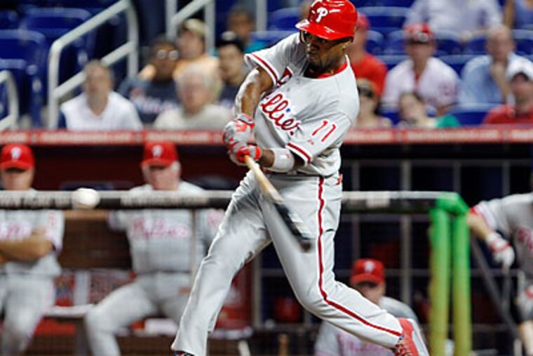 Phillies shortstop Jimmy Rollins led off the game with a solo home run. (Wilfredo Lee/AP)