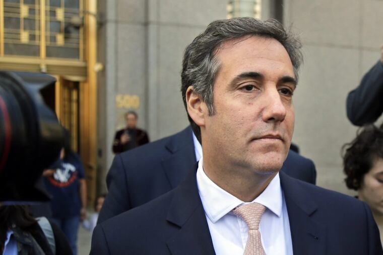 In this April 26, 2018 file photo, Michael Cohen leaves federal court in New York City.