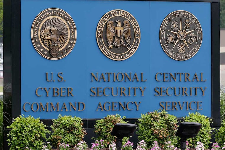 FILE - This June 6, 2013 file photo shows the sign outside the National Security Agency (NSA) campus in Fort Meade, Md. Compared with their more moderate Republican or Democratic peers, tea party supporters and liberals are significantly more likely to oppose the collection of millions of ordinary citizens’ telephone and Internet data, an Associated Press-GfK poll shows. By a 2-to-1 margin, both tea party supporters and liberals say the government should put protecting citizens’ rights and freedoms ahead of protecting them from terrorists. (AP Photo/Patrick Semansky, File)