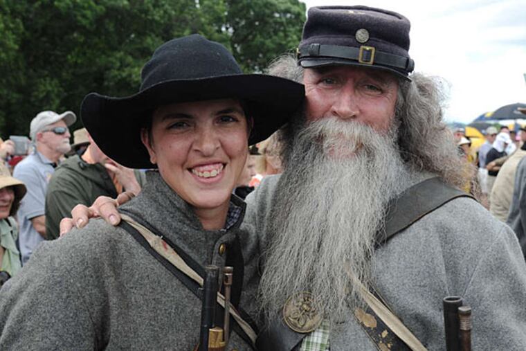Terry Papavasilis, 31, of Philadelphia, with David Zarr, 60, was among the reenactors. CLEM MURRAY / Staff