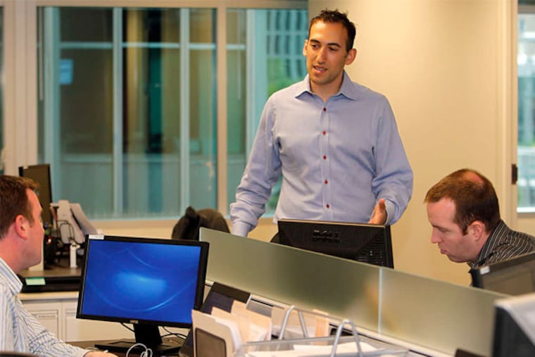 Dan Roitman, of Stroll, in the language-learning firm's Philly office. (Akira Suwa / Staff Photographer)